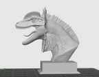 Side view of dilophosaurus bust sculpture