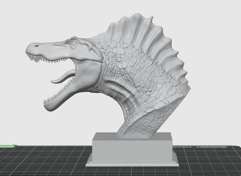 Side view of dinosaur bust sculpture