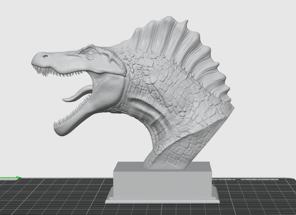 Side view of dinosaur bust sculpture